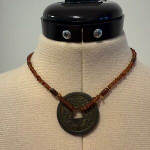 Necklace with Cornelian from Thailand and an old coin from Thailand